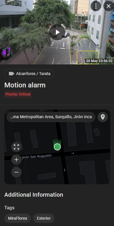 Event details sidebar for a Motion alarm event showing the camera snapshot, priority, and location on the map