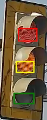 Correct example of light frames tightly bounding the red, yellow, and green traffic light lenses